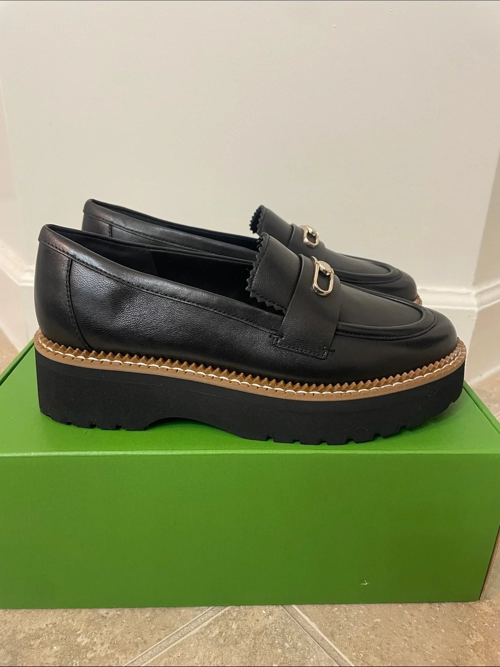 kate spade Black Leather Platform Loafers with Gold Spade Accent